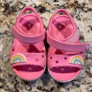 Pink rainbow croc sandals